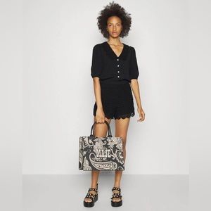 Maje Black Jumpsuit with Button Detail